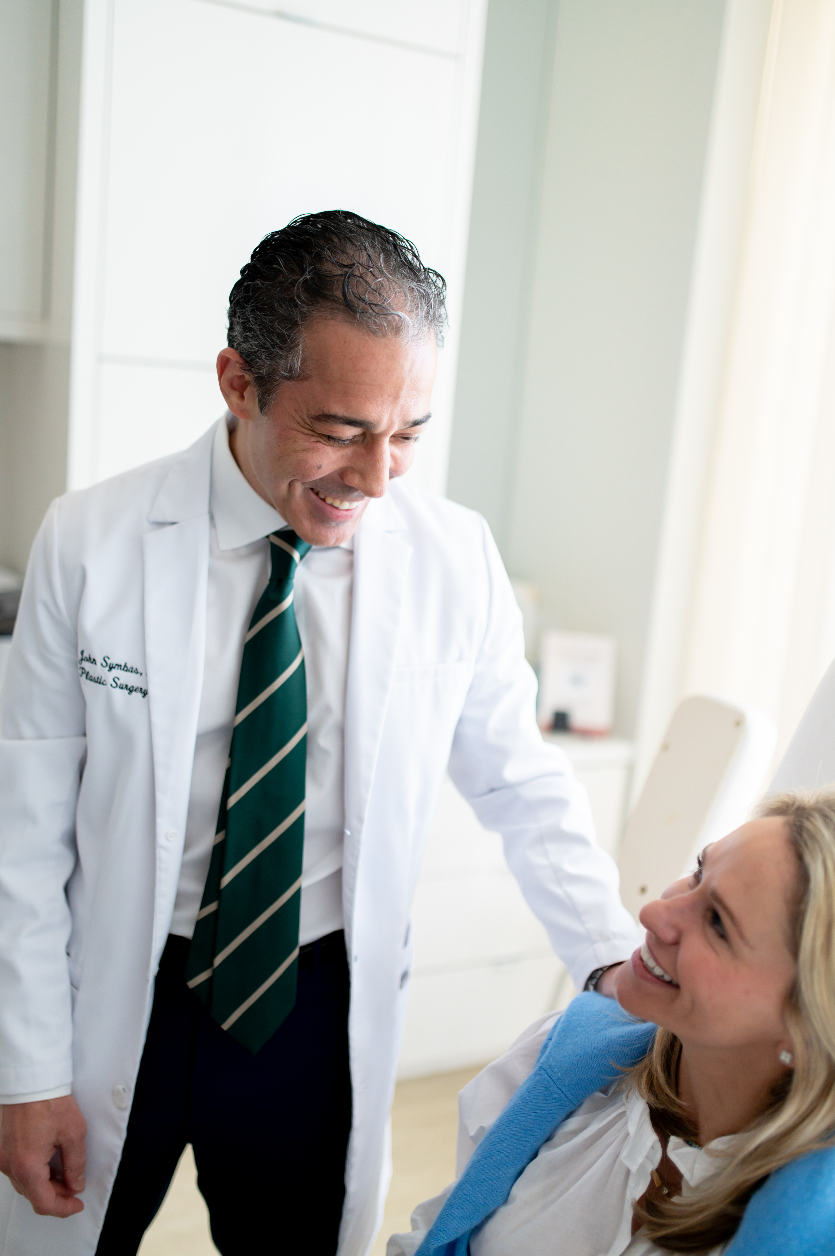 Dr. Symbas during a patient consultation